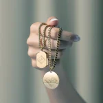Iman Hazimeh jewellery logo, luxury brand identity, gold brand palette, Arabic calligraphy logo
